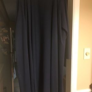Navy blue mid-calf length button up cardigan. NWOT